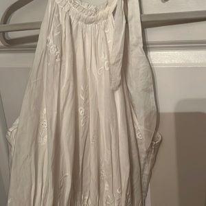 White dress embroidery shorter in front longer in the back